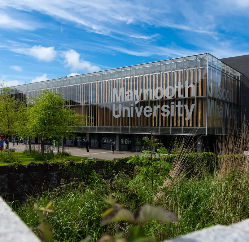 Maynooth University library with a blue sky behind it