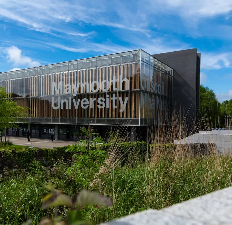 Maynooth University library with a blue sky behind it